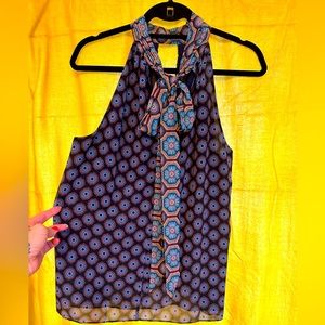 No tag but it’s Cynthia Rowley poly/silk foulard print cutaway shoulder blouse.